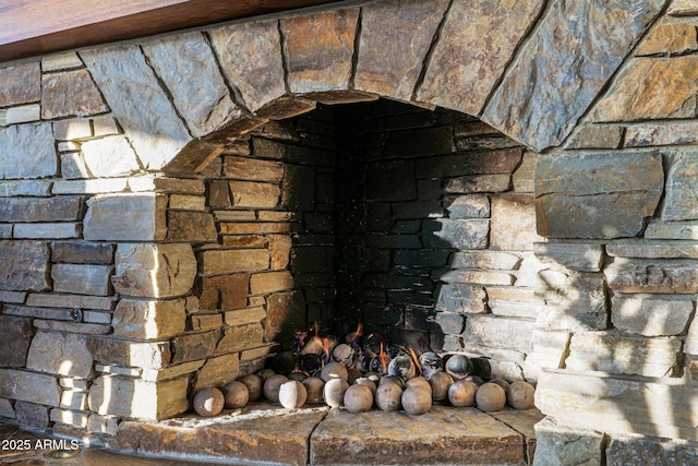 details featuring a stone fireplace