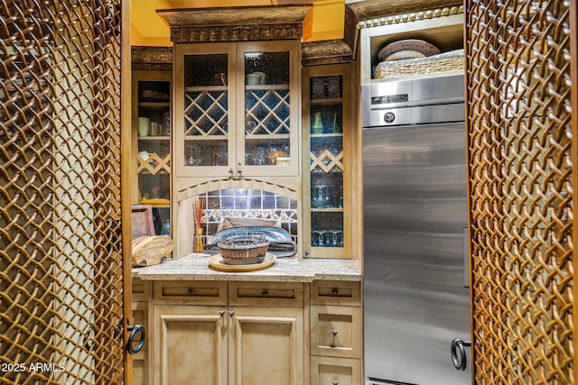 kitchen featuring stainless steel built in refrigerator