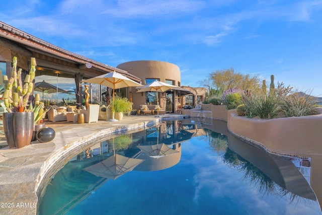 view of pool with a patio