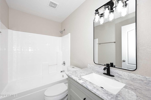 full bathroom featuring shower / bathing tub combination, vanity, and toilet