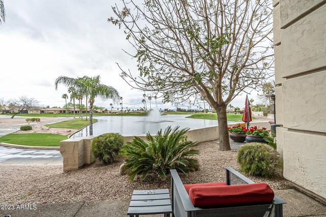 exterior space with a water view