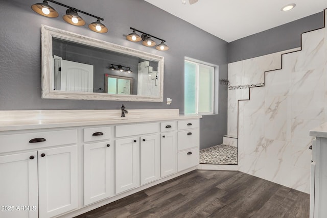5321 N 196th Ave, Litchfield Park, AZ 85340 - full bath with vanity, a walk in shower, and wood finished floors