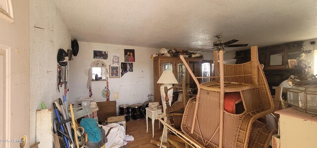 11150 E Clatterbuck Dr, Cornville, AZ 86325 - interior space with ceiling fan, wood finished floors, and a textured ceiling