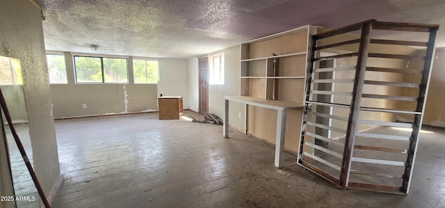11150 E Clatterbuck Dr, Cornville, AZ 86325 - unfurnished room featuring hardwood / wood-style floors and a textured ceiling