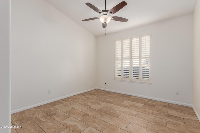 spare room with vaulted ceiling and ceiling fan