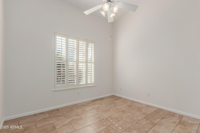 unfurnished room featuring vaulted ceiling and ceiling fan