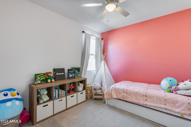 bedroom with light colored carpet and ceiling fan