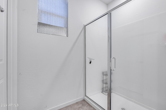 bathroom featuring walk in shower