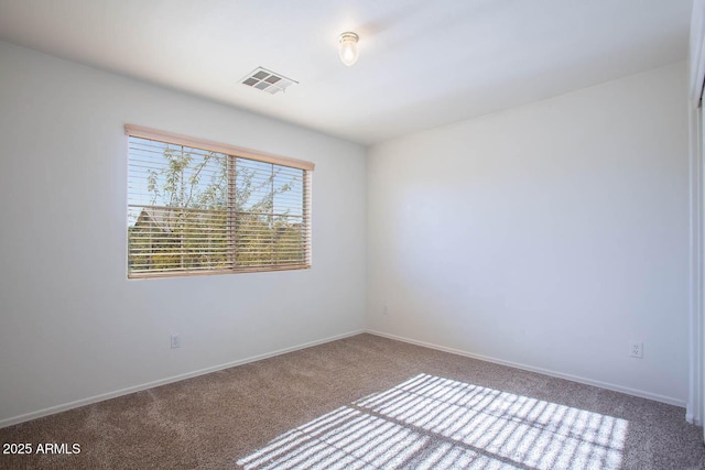 empty room featuring carpet