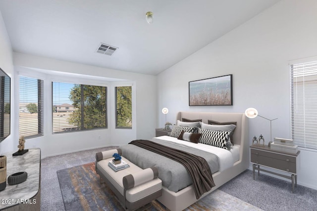 bedroom featuring carpet and lofted ceiling