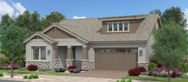 view of front of property with a garage