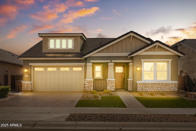 craftsman house featuring a garage