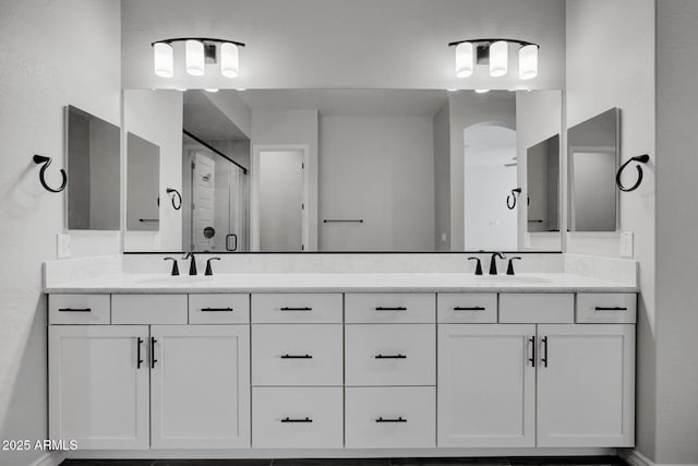 bathroom featuring vanity and walk in shower