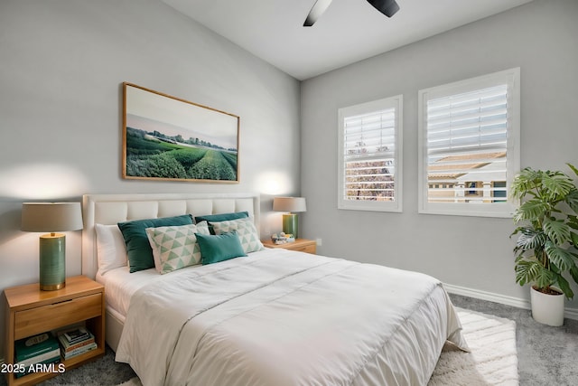 bedroom with ceiling fan and carpet flooring