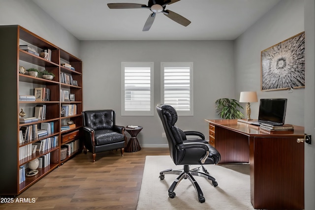 office area featuring hardwood / wood-style floors and ceiling fan