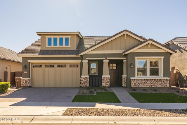 craftsman-style home with a garage