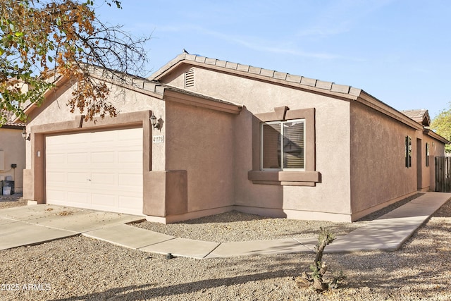 view of property exterior with a garage