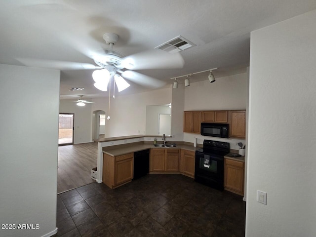 kitchen featuring black appliances, sink, ceiling fan, kitchen peninsula, and track lighting