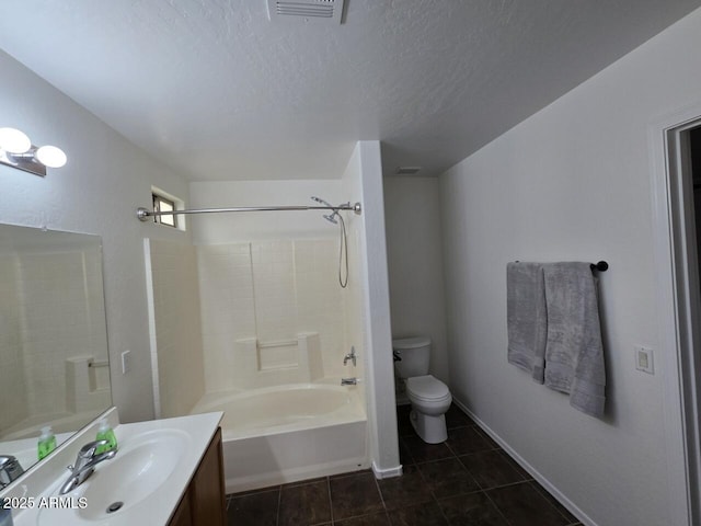 full bathroom with toilet, a textured ceiling, shower / washtub combination, vanity, and tile patterned flooring