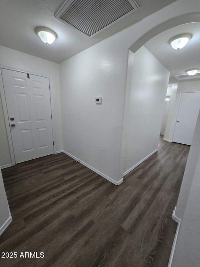 entrance foyer featuring dark hardwood / wood-style floors