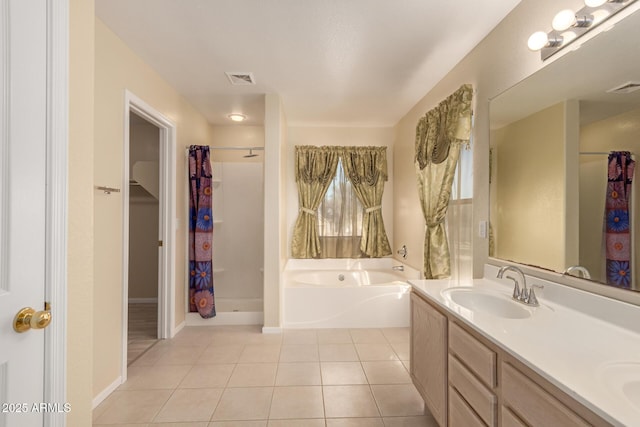 bathroom with separate shower and tub, tile patterned floors, and vanity