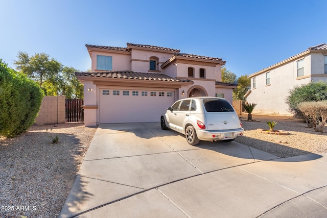 mediterranean / spanish-style house featuring a garage