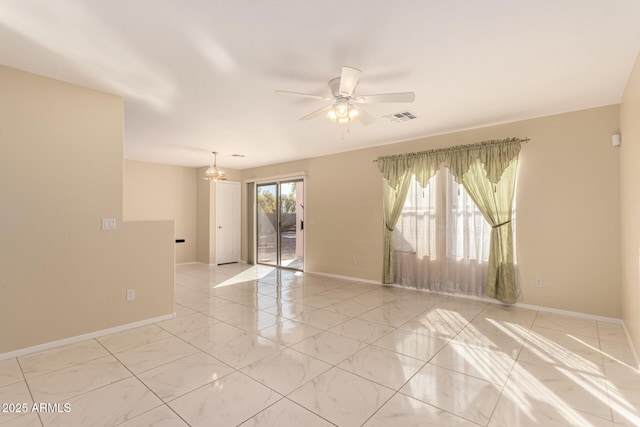 empty room featuring ceiling fan