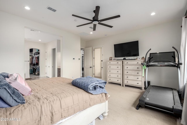 12834 W Forest Pleasant Pl, Peoria, AZ 85383 - carpeted bedroom featuring recessed lighting, a ceiling fan, a walk in closet, and a closet