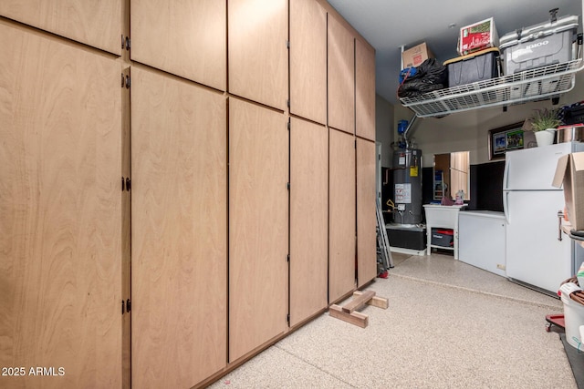 12834 W Forest Pleasant Pl, Peoria, AZ 85383 - garage with freestanding refrigerator, gas water heater, and a sink