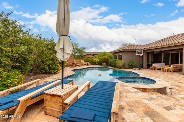 12834 W Forest Pleasant Pl, Peoria, AZ 85383 - view of swimming pool featuring an outdoor hangout area, a patio, and a pool with connected hot tub
