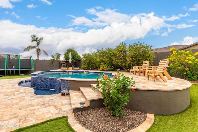 12834 W Forest Pleasant Pl, Peoria, AZ 85383 - view of swimming pool featuring a trampoline, a patio area, and a fenced backyard