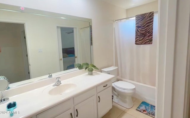 full bathroom with shower / bathtub combination with curtain, tile patterned flooring, vanity, and toilet