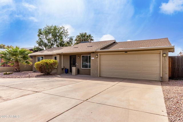 ranch-style home featuring a garage