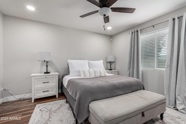 bedroom featuring hardwood / wood-style floors and ceiling fan