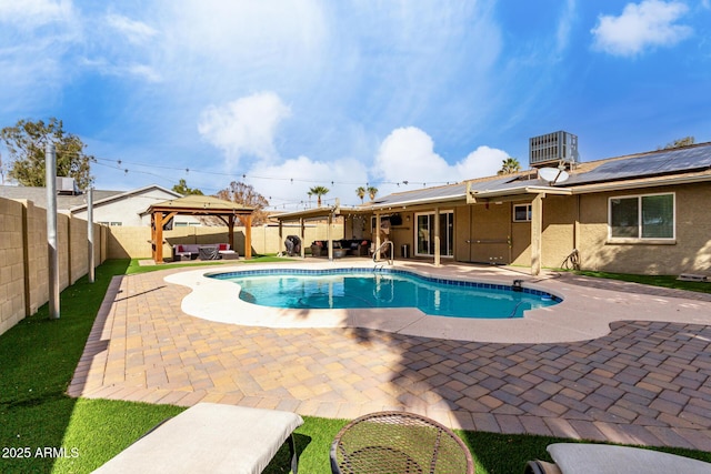view of pool featuring a patio area, central AC unit, and a gazebo