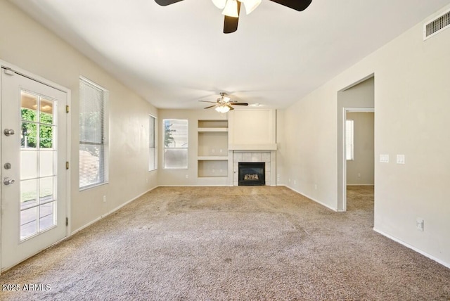 2880 E Nunneley Rd, Gilbert, AZ 85296 - unfurnished living room featuring a ceiling fan, carpet flooring, healthy amount of natural light, and baseboards