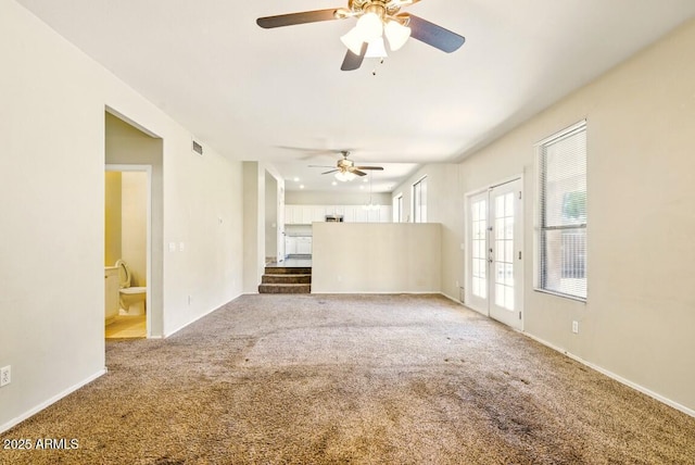 2880 E Nunneley Rd, Gilbert, AZ 85296 - unfurnished living room featuring carpet, ceiling fan, baseboards, and french doors