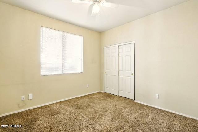 2880 E Nunneley Rd, Gilbert, AZ 85296 - unfurnished bedroom with carpet flooring, a closet, baseboards, and ceiling fan