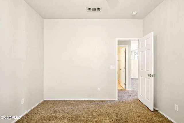 2880 E Nunneley Rd, Gilbert, AZ 85296 - empty room featuring carpet flooring, baseboards, and a smoke detector
