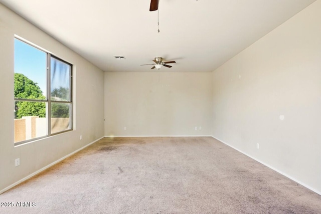 2880 E Nunneley Rd, Gilbert, AZ 85296 - spare room featuring ceiling fan, light carpet, and baseboards