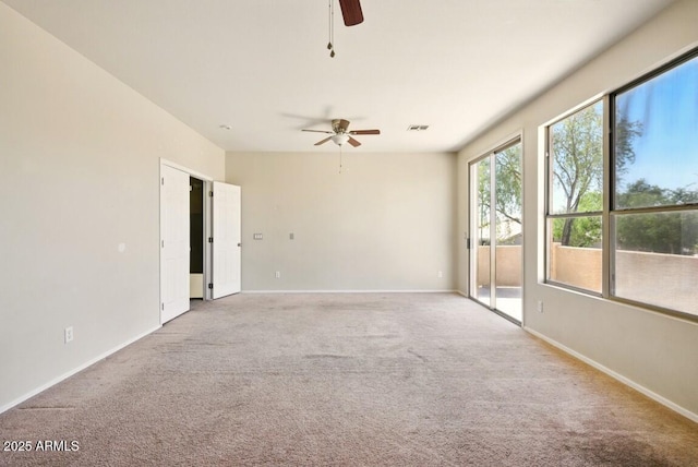 2880 E Nunneley Rd, Gilbert, AZ 85296 - empty room with a ceiling fan, light carpet, and baseboards