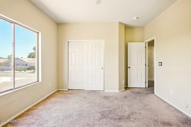 2880 E Nunneley Rd, Gilbert, AZ 85296 - unfurnished bedroom featuring carpet flooring, baseboards, and a closet