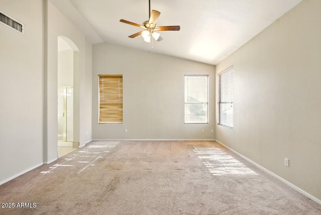 2880 E Nunneley Rd, Gilbert, AZ 85296 - spare room with vaulted ceiling, carpet, a ceiling fan, arched walkways, and baseboards