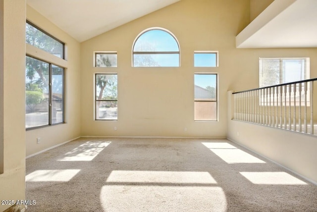 2880 E Nunneley Rd, Gilbert, AZ 85296 - carpeted spare room featuring plenty of natural light, lofted ceiling, and baseboards