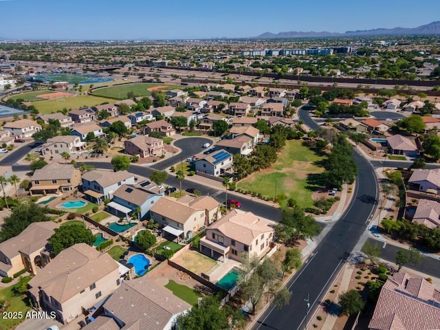 2880 E Nunneley Rd, Gilbert, AZ 85296 - view of property location with a pool area, nearby suburban area, and a mountain backdrop