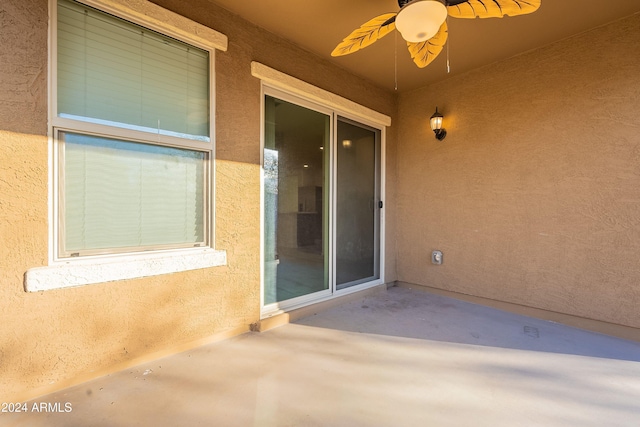 view of patio / terrace featuring ceiling fan