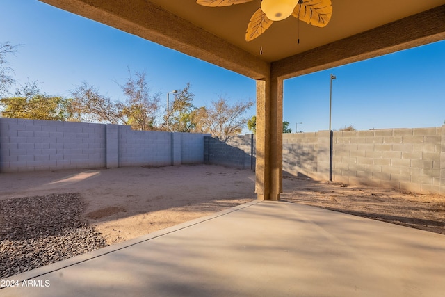 view of patio featuring ceiling fan