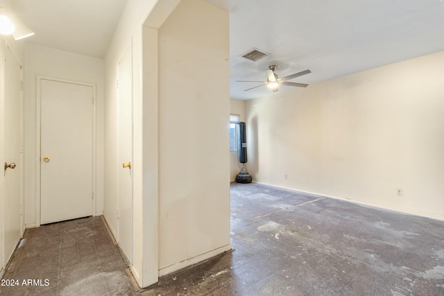 interior space featuring ceiling fan