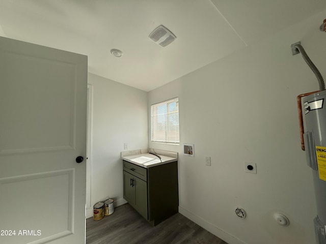 bathroom featuring hardwood / wood-style floors, vanity, and water heater