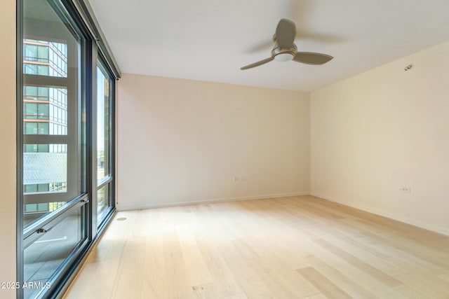 4808 N 24th St Unit 923, Phoenix, AZ 85016 - spare room with light wood finished floors and a ceiling fan